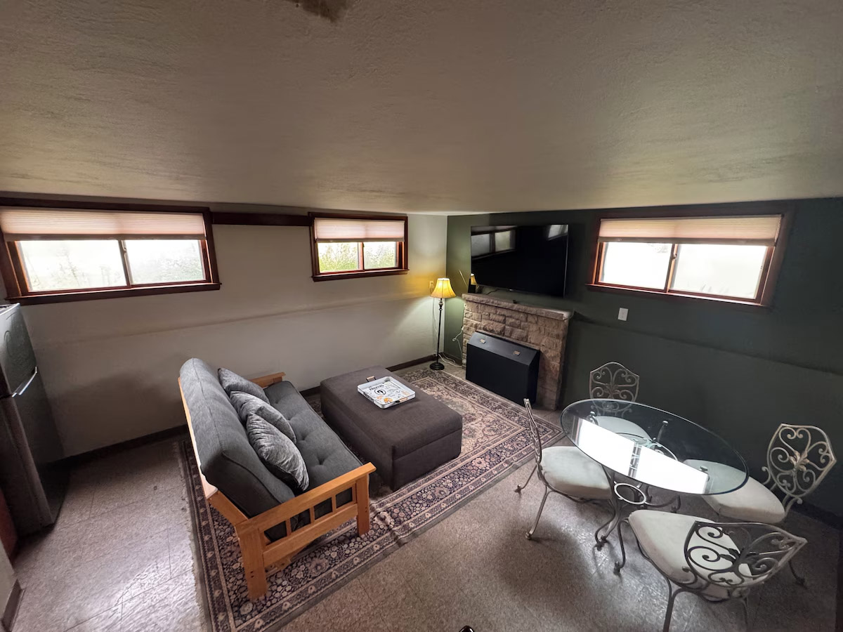 Game room — futon sleeping & seating for the whole crew